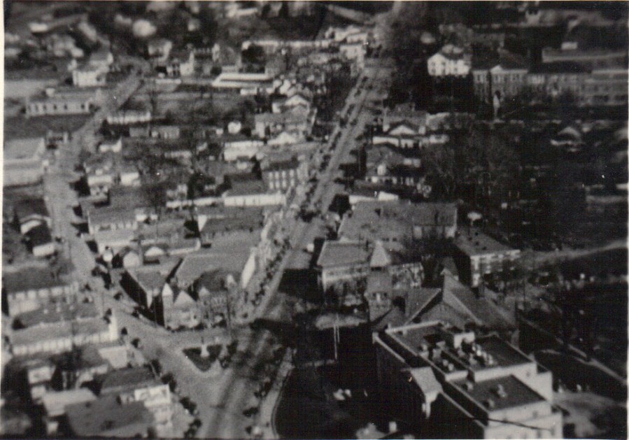 1920s aerial view looking over Rockville. Red Brick Courthouse tower can be seen top left.
