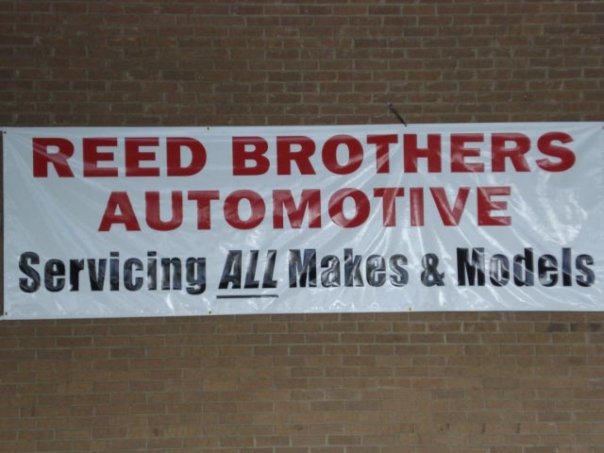 Reed Brothers Automotive Signs Go Up