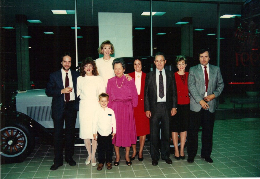 Photo of the Gartner Family standing in front of the 1928 Dodge Brothers Standard Six taken at 1970 Grand Opening of the new location.