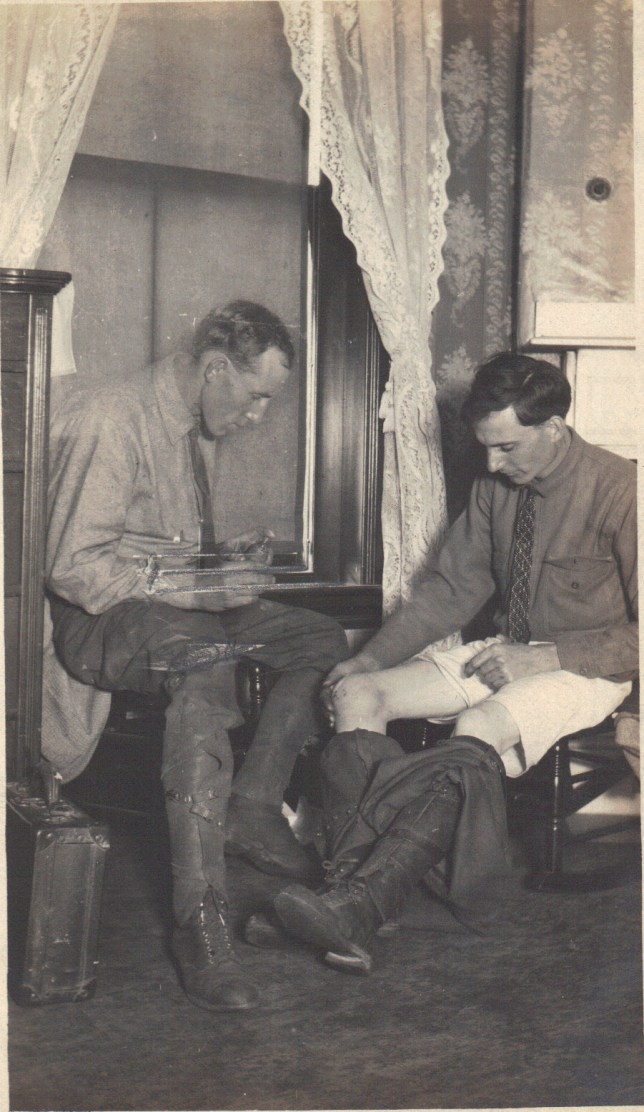 Lewis Reed patching up Uncle Bernie after he fell off motorcycle