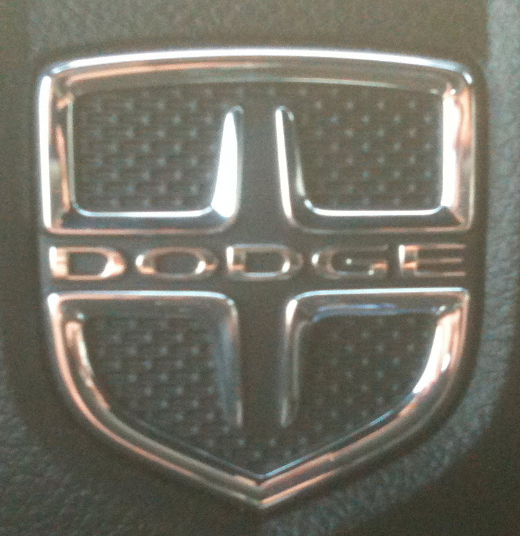 Crosshairs and shield logo on the steering wheel are used on all models starting 2011 year (with the exception of the 2011-12 Caliber and Nitro having the Ram logo.)