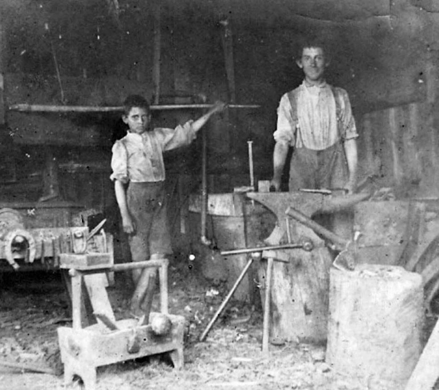 Inside Blacksmith shop early 1900s
